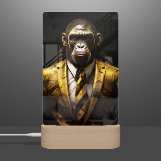 Lamp monkey in gold suit and tie