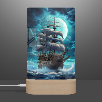 Lamp ship with the moon with clouds over it