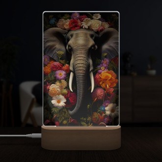 Lamp elephant surrounded by flowers and leaves